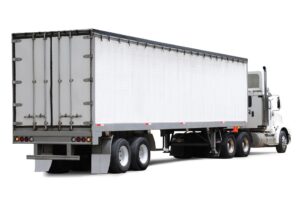 Rear and side view of a commercial truck over white background. Soft feather applied.