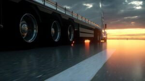 Semi Truck Wheels Closeup on asphalt road highway at sunset - transportation background. 3d rendering.